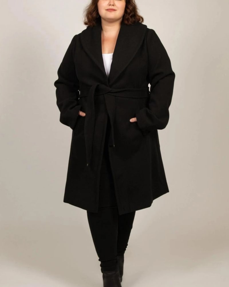 Front of a model wearing a size XL Hazel Coat Round Collar Belted Pockets in Black by ANNICK. | dia_product_style_image_id:309530